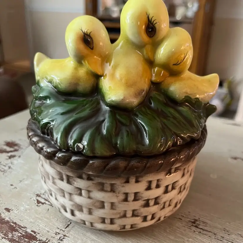 Three Ducklings In A Basket