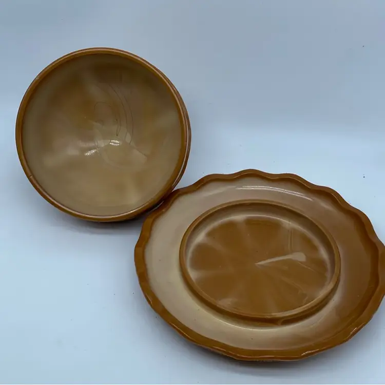 #1124 Greentown caramel slag glass butter dish with a domed lid