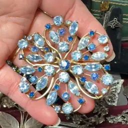 Vintage Regency MCM Goldtone Blue Navette Rhinestone Flower Brooch