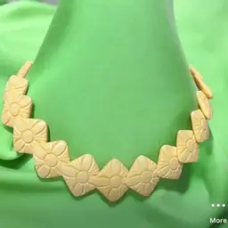 Hand carved Bovine necklace