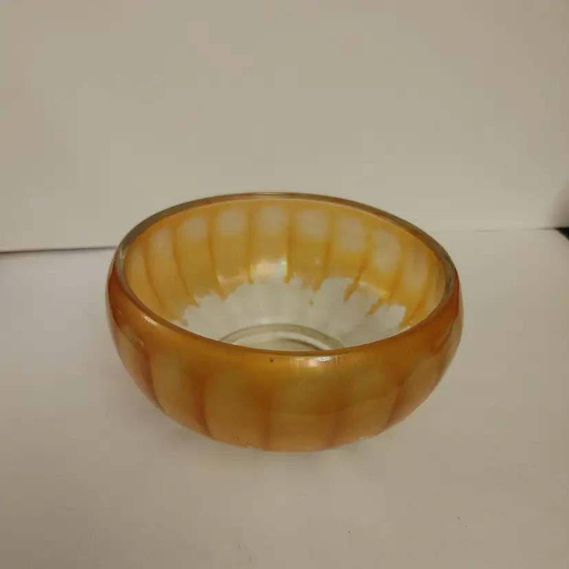 Vintage Imperial glass Marigold carnival glass bowl. 1910-50's. Flashing is missing towards bottom of bowl. No chips. 2.75 high.