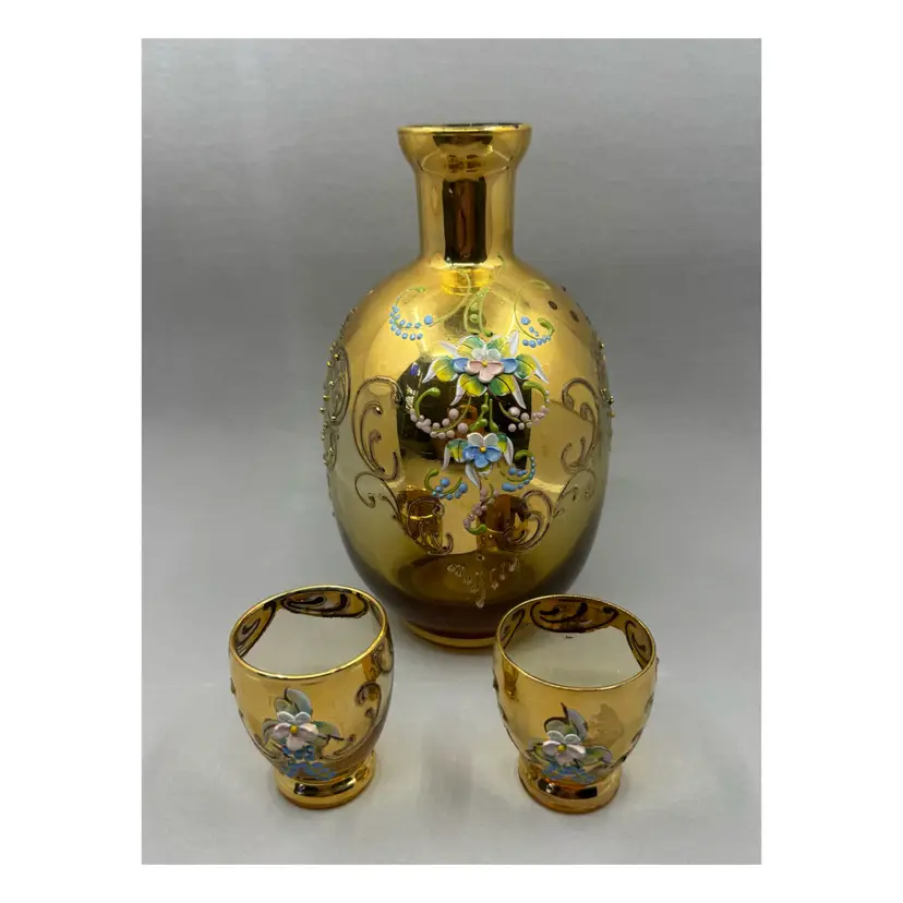 Gilded art glass vase with two matching cups, hand-painted floral motifs