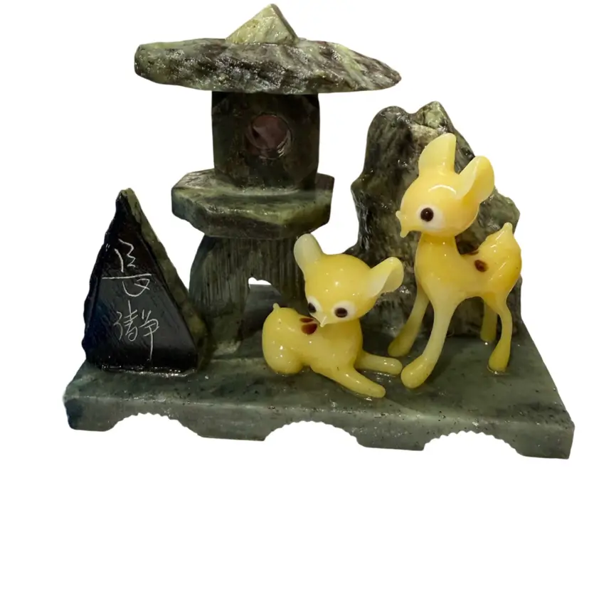 vintage Japanese souvenir from Nara Park featuring yellow art glass fawns on a stone-like base.