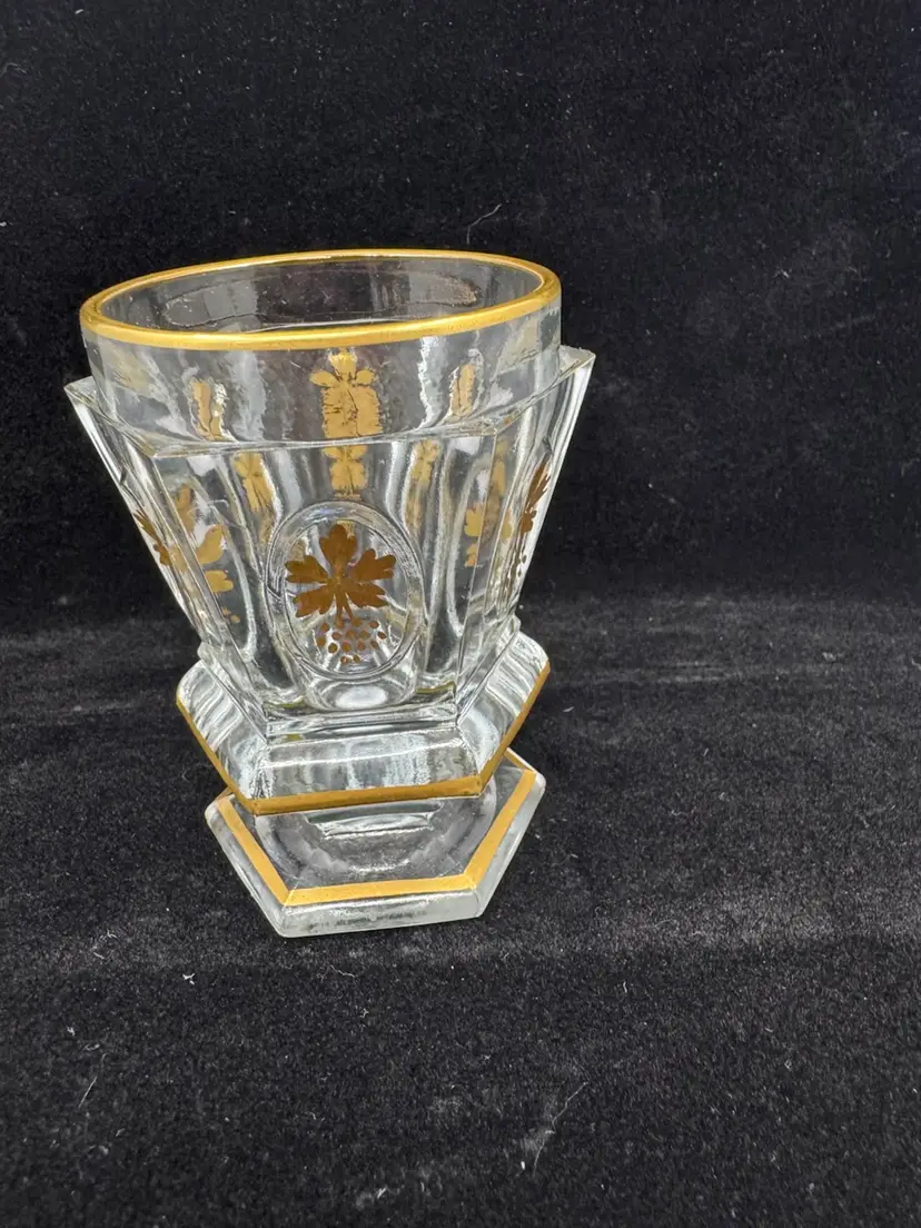 Antique Bohemian gilded glass hexagonal cup with grapevine motif, Glows Green