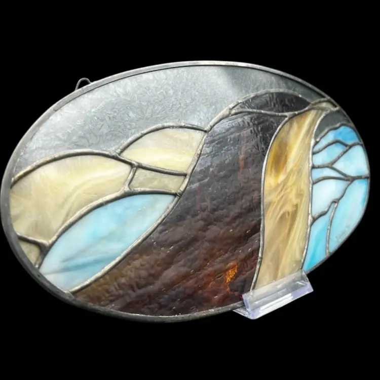 #345B Vintage Oval Leaded Stained Glass Sun Catcher Landscape Blues & Browns Each Color Has A Unique Texture 
Signed Shirkey ‘80