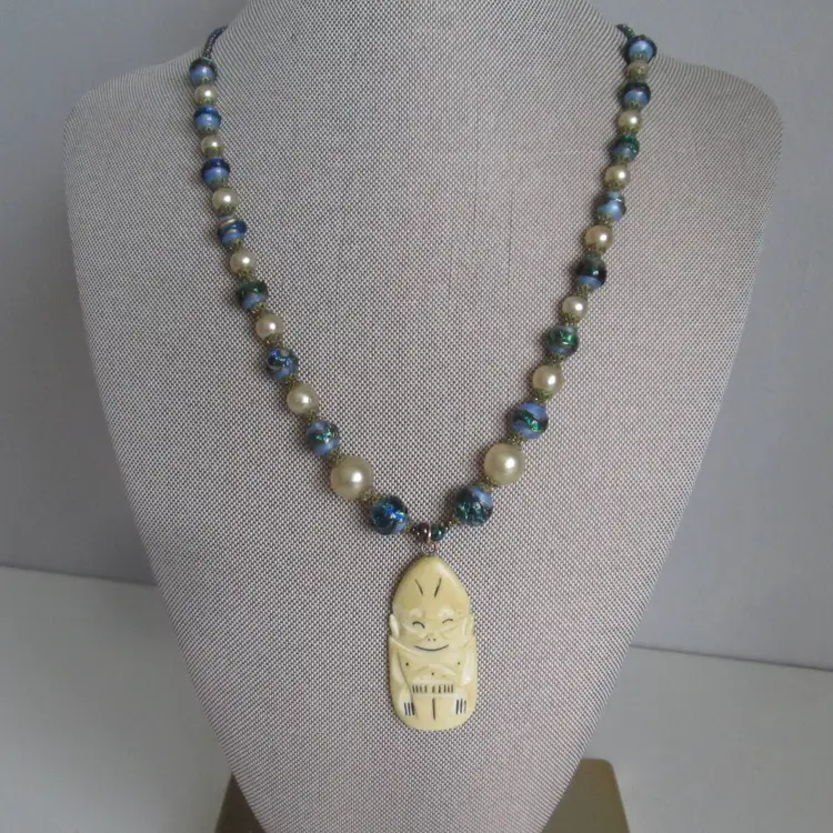 Antique Billiken Pendant with Blue and Ivory Beaded Necklace