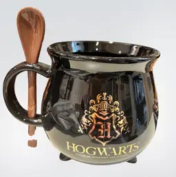 Harry Potter cauldron mug featuring the Hogwarts crest