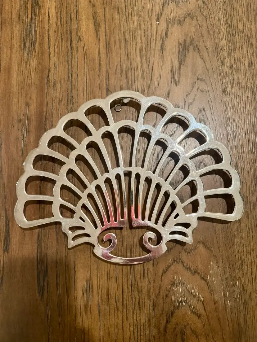 vintage F.B. Rogers Silver Co. silver-plated trivet in scallop shell/fan design, popular in the 1970s