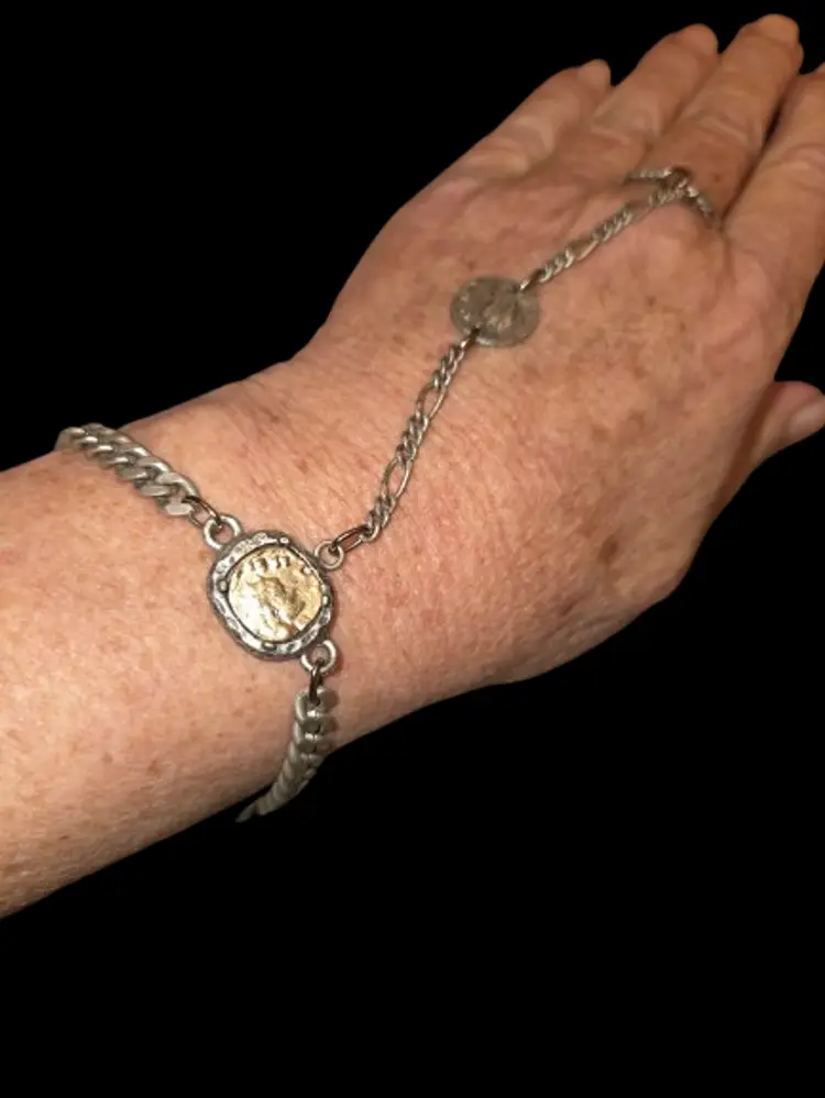 TAT2 Finger Bracelet featuring coins