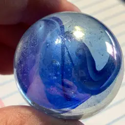 Clear w/Blue Swirl Iridescent Glass Marble 1 1/2"