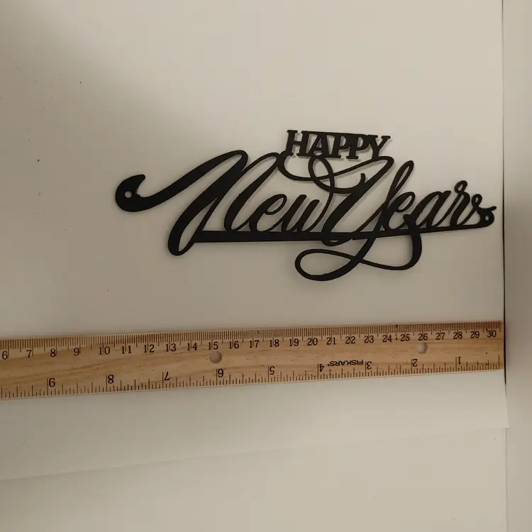 Metal Happy New Years sign. 2nd one. Dimensions: W 8, H 3.