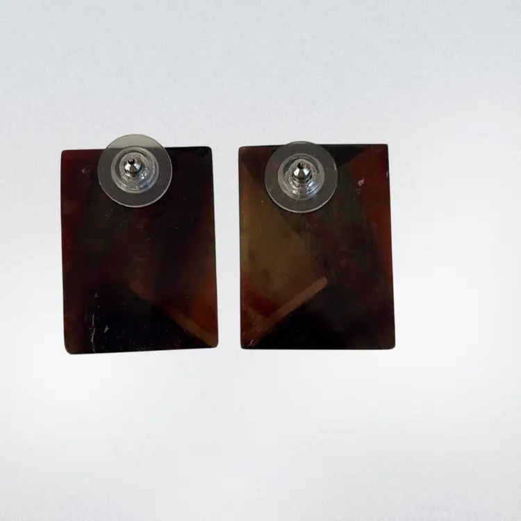 This is a pair of multi-color Stones inlay Pierced earrings. 1” X 1 1/4”