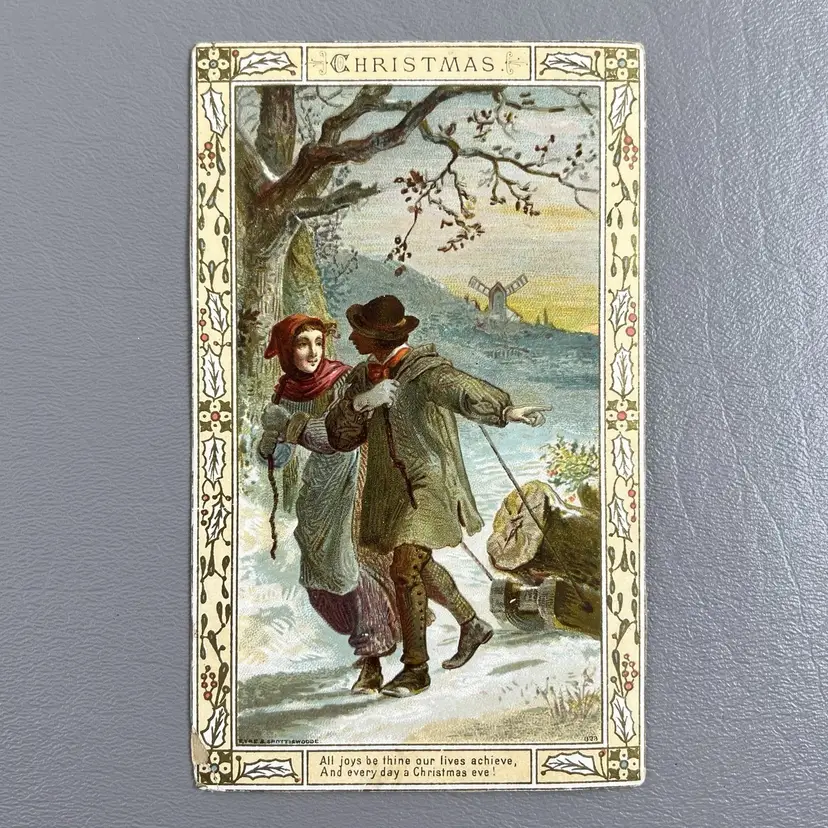 Victorian Christmas Greeting Card Couple Pulling Sled Firewood Windmill Holiday 5.5x3.25"  Eyre & Spottiswoode