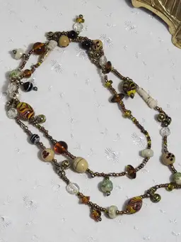 Decorative art glass millefiori and textured bead necklace