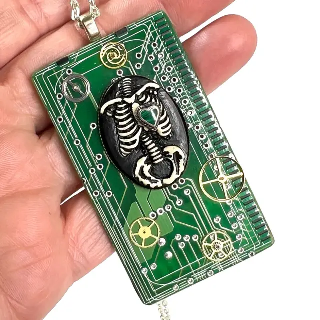 Macabre Halloween Necklace- Abstract Frankenstein Monster. Handmade by me. ♻️Recycled computer circuitboard. Pendant Size: 1-1/2