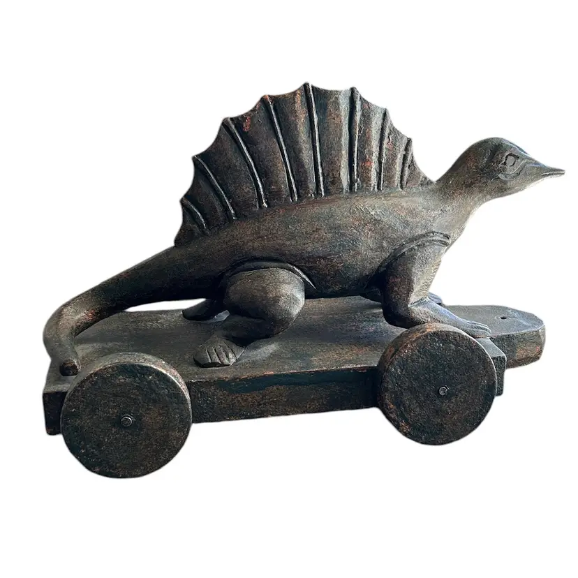 Wood Carved Black With Red Undertone Stain Dimetrodon Dinosaur On Wheels