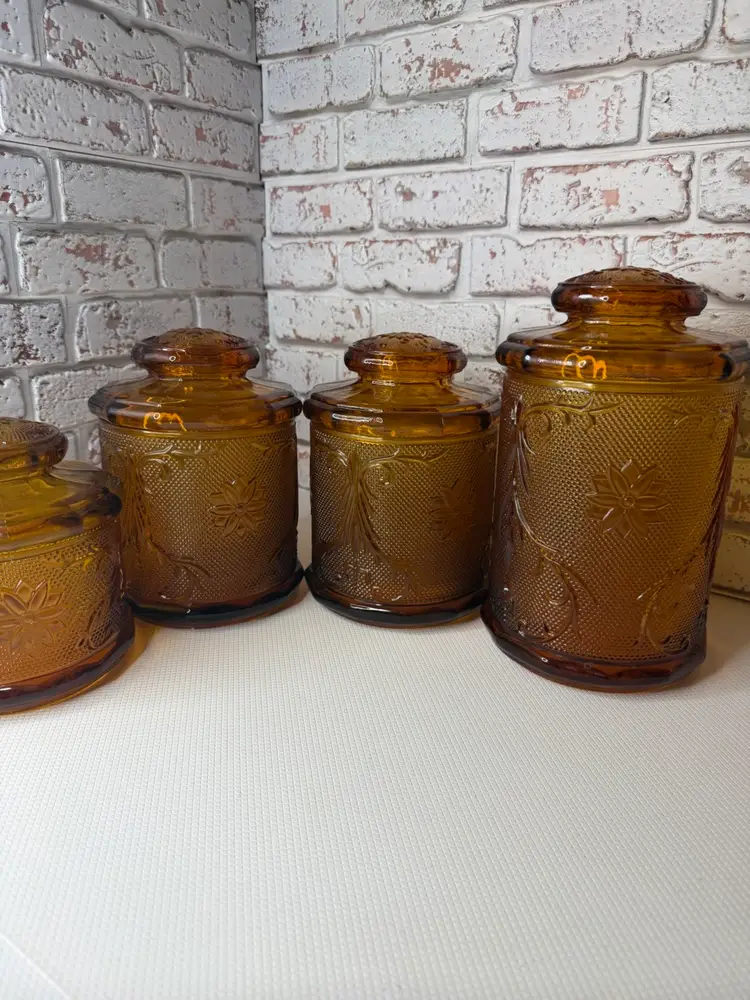 a set of vintage Tiara Indiana Glass Amber Canisters in the "Sandwich" pattern Set One