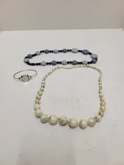 2 necklaces and a bracelet
