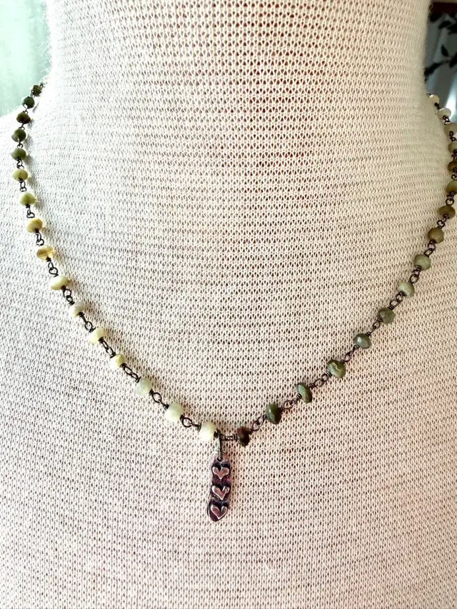Three Heart Artisan Pendant On Serpentine Rosary Style Necklace