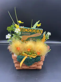 Spring/Easter vignette/assemblage. 3 ducks in a basket.