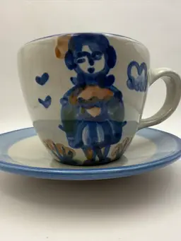 M.A. Hadley Signed Hand Glaze Painted Farmers Wife Teacup 2.5” & Saucer 6”