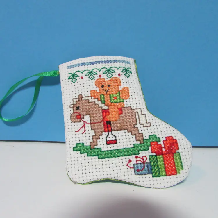 #01 completed handmade cross stitch small Christmas stocking ornament rocking horse