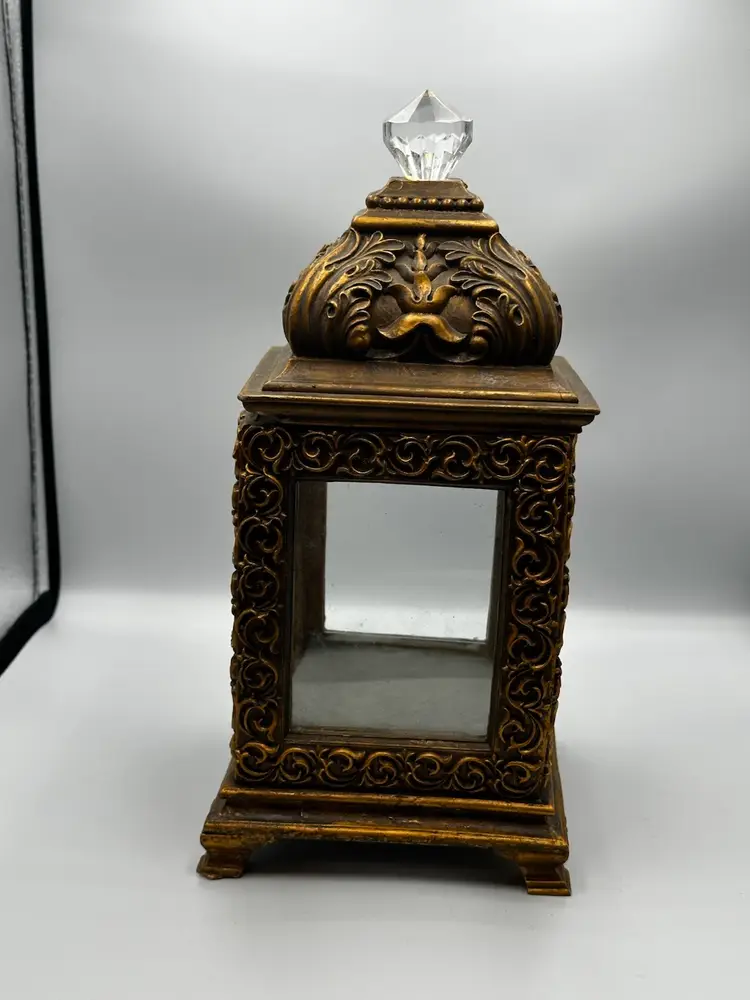 Decorative ornate gold-tone lantern
