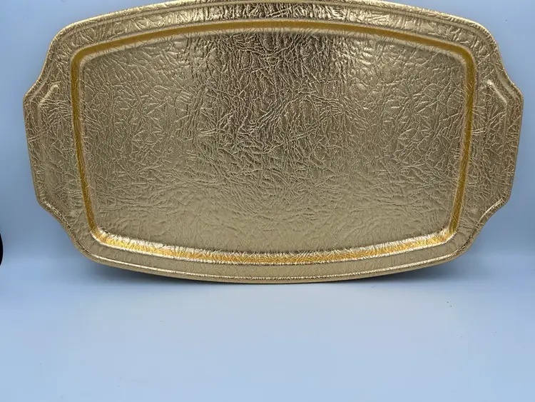 **Gold Aluminum Tray Embossed With Filigree.