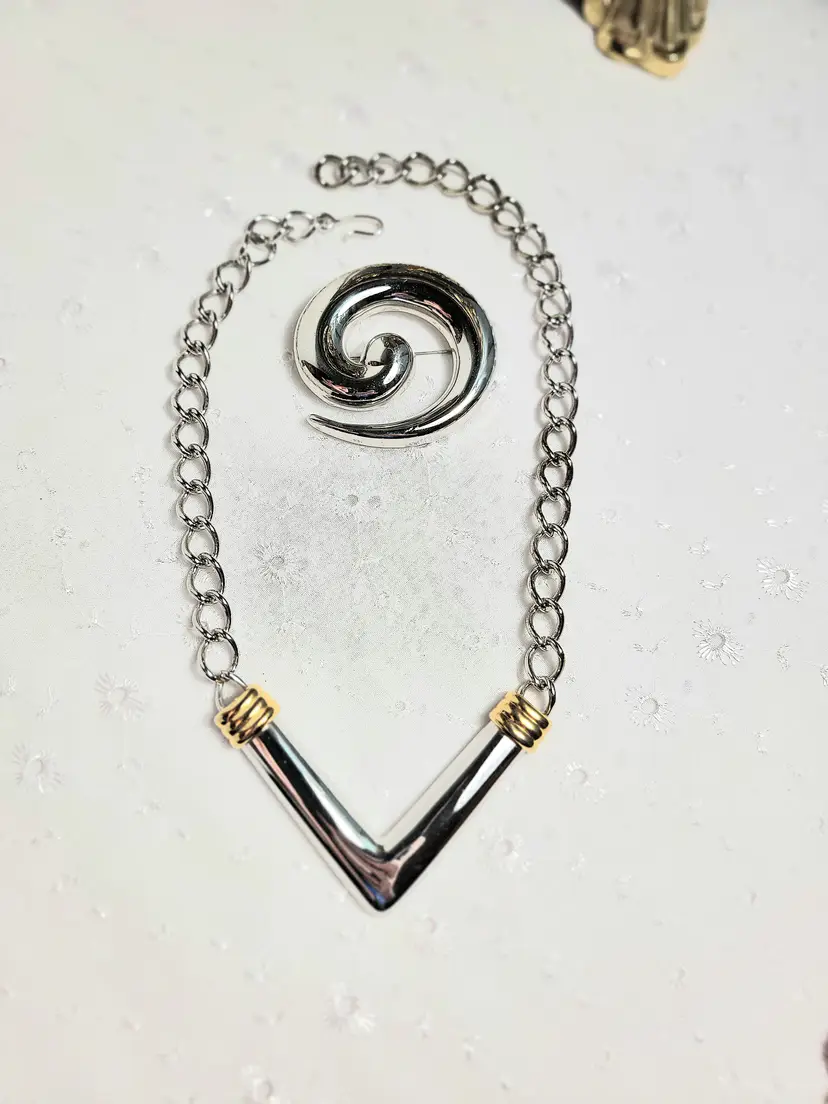 Monet silver and goldtone statement necklace and Swirl brooch