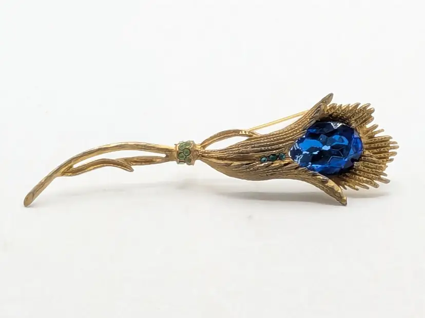 Vintage Gold Tone Flower Brooch with Blue Glass Gemstone