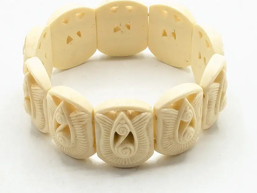 Vintage Avon Gracious Tulips Stretch Carved Cream Bracelet