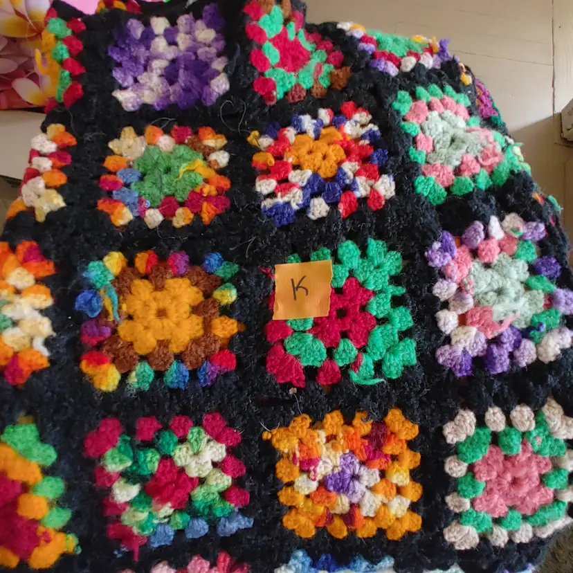 Afghan K- approx size 44 x 67. Granny squares. As shown.