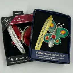 2 Butterfly Metal Ornaments Signed Harvey Lewis For Children’s Cancer Research Fund Made With Crystallized Swarovski Elements Still In The Box.