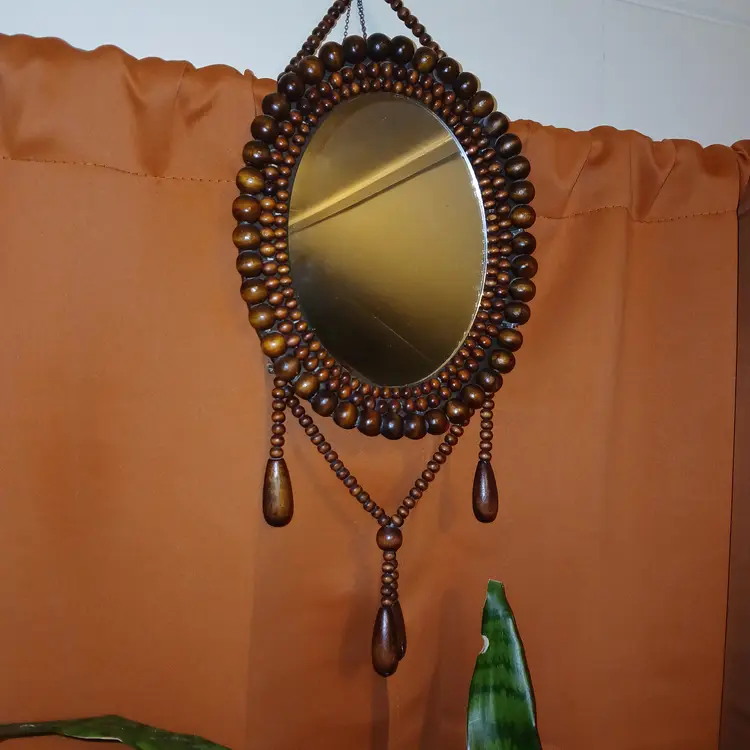 Beaded wall mirror