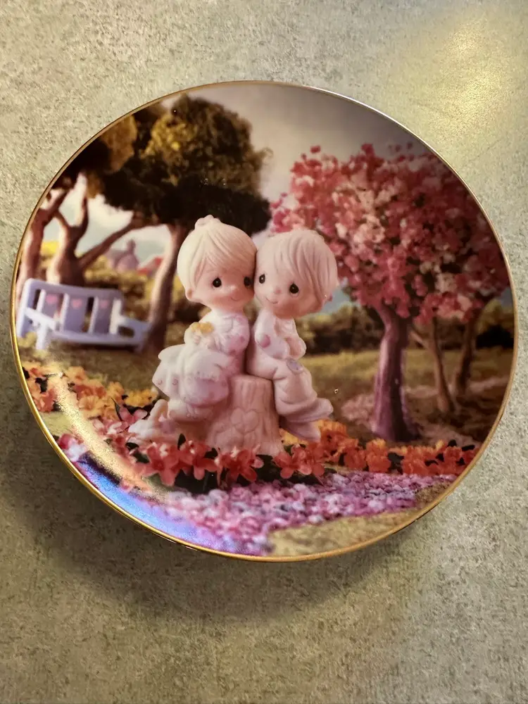 Porcelain decorative plate titled 'Love One Another' by Precious Moments