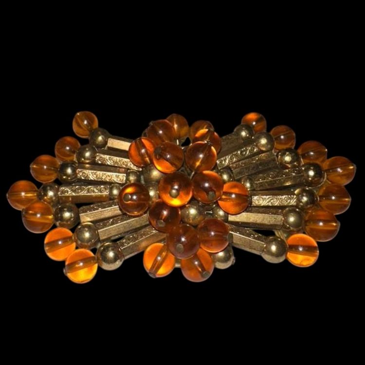 Vintage Gold tone with Amber beaded brooch
Plastic backing 3.5” X 2”