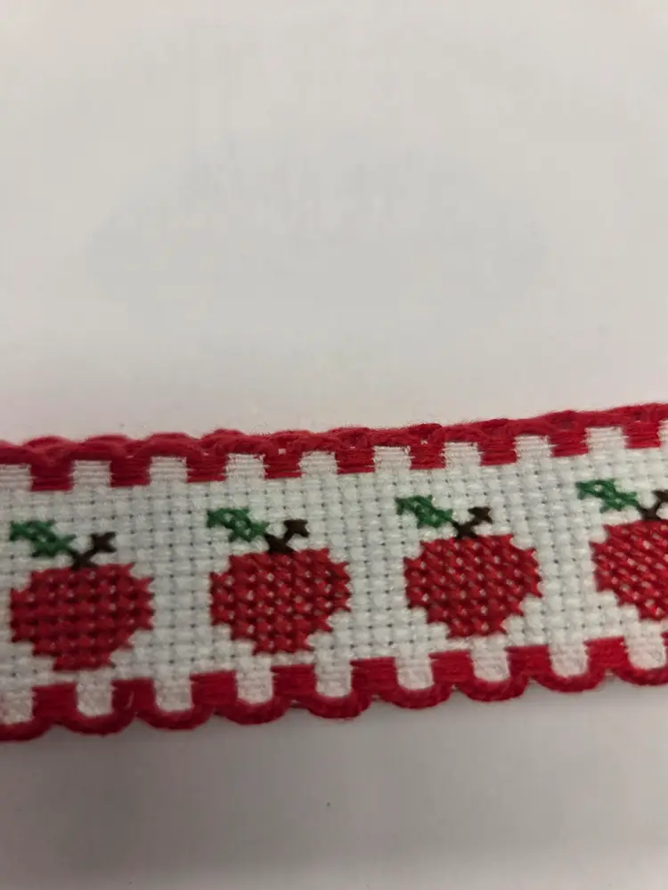 New Cross-stitched Ribband piece apple themed great for adding to a craft.