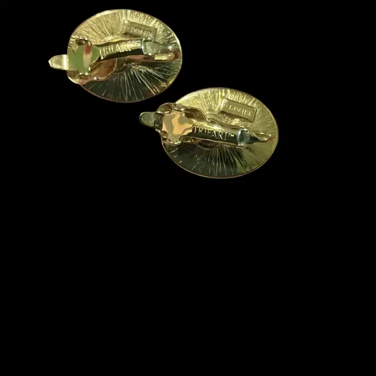 Vintage Goldtone Trifari Clip Earrings . Oval Shape With White Lucite Center Cabochons.