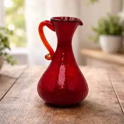 Vintage. Red Art Glass Pitcher Vase Crackle Glass with Amber Glow Handle and Top Rim 7.5" Tall