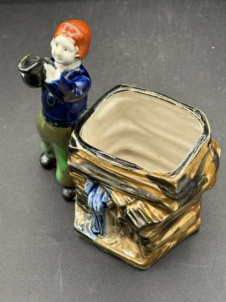 Vintage planter - Dutch boy drinking at well