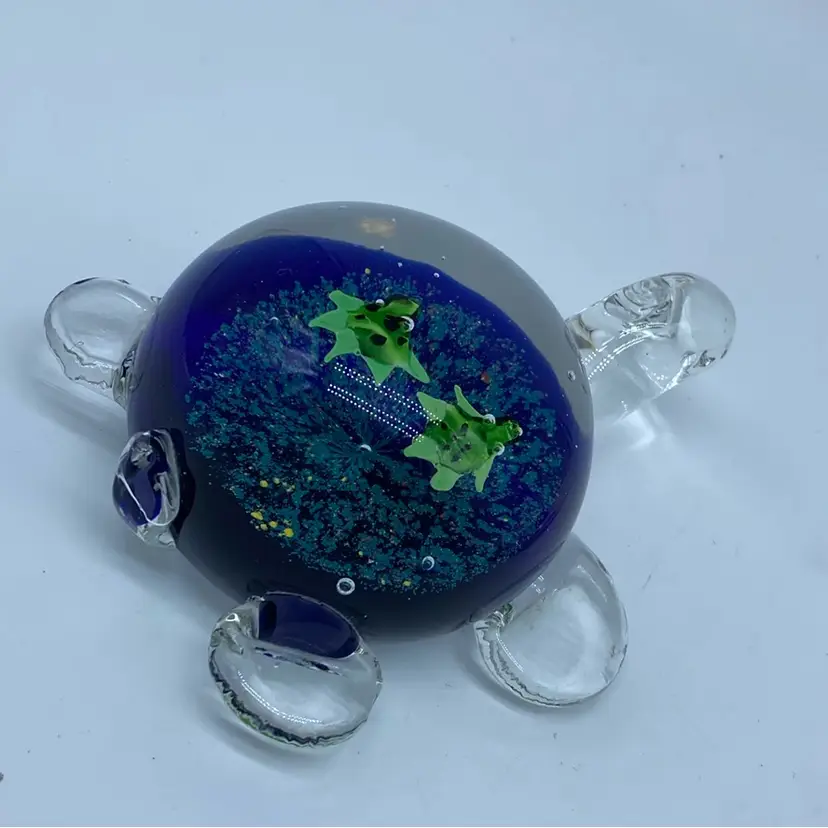 #0034 Hand-blown art glass turtle figurine with internal blue and green design 6”
