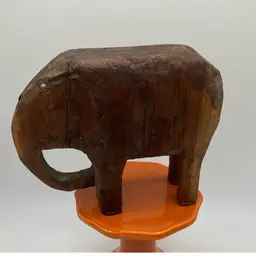 Carved Rustic Wood Elephant With Metal Eyes
