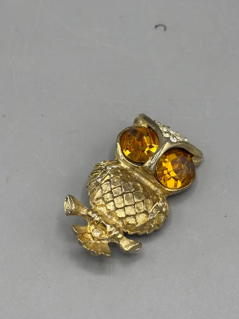 Vintage yellow tone owl with big yellow eyes