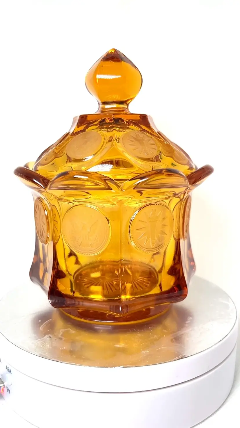 Fostoria Coin Amber Glass 6” Candy Dish. Vintage With Eagle & Torch Imprinted On Coin. 6” tall x 4-1/4” wide.
