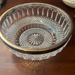 silver-plated rim cut glass serving bowl. 9” Circa 1950-1970s 
Does Have Some Patina Around Silver Rim Pictured .