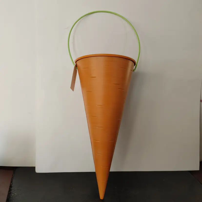 #02 - Metal Carrot Cones. Has attachment that says "For The Easter Bunny". Perfect for kids to put carrots in for the Easter Bunny. 8 inches high.