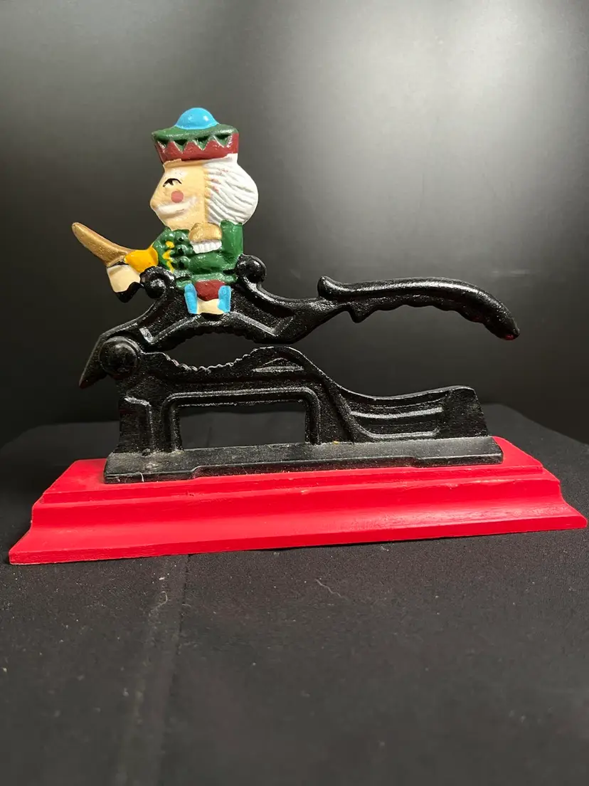 Cast Iron w/ Wooden Base Nutcracker....Nut Cracker
