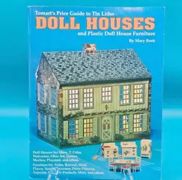 Tomart's Price Guide To Tin Litho Doll Houses And Plastic Doll House Furniture. (Very Slight Wear) 11"