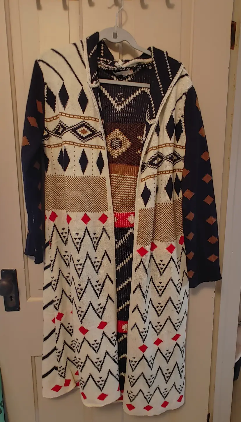 Top- Brand: Amanda's Collection. Size Small/medium. Cream with navy and brown aztec Cardigan. 85% Cotton, 15% polyester.