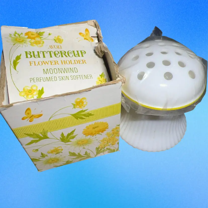Avon Buttercup Flower Holder with Moonwind Perfumed Skin Softener.1970s. Contains Small Amount Of Cream. Milk Glass Jar And Flower frog